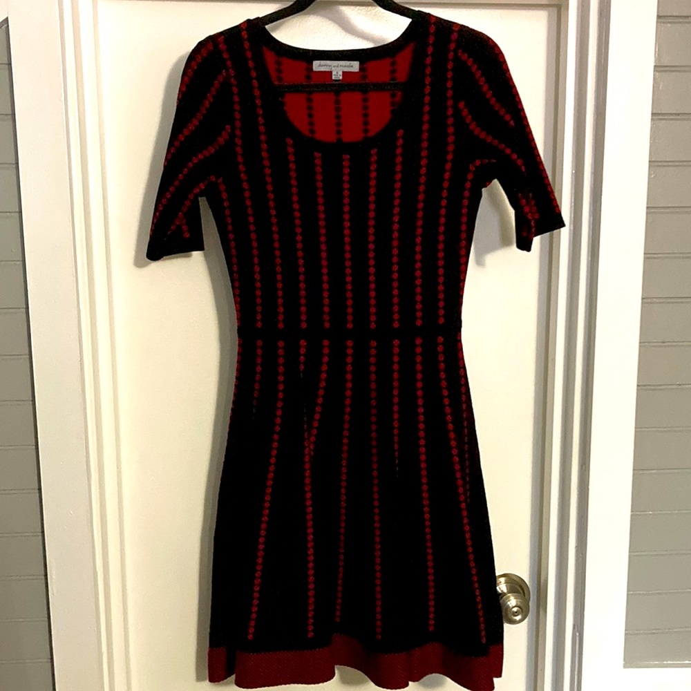 Black sweater dress with red polka dots